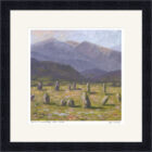 Lake District art framed print Dawn at Castlerigg Stone Circle by Jeff Sudders in a black frame.