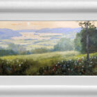 Lake District art original oil painting by Jeff Sudders. Summer at Waterhead featuring green meadows overlooking lake Windermere at sunset. Displayed in a white cushioned frame.