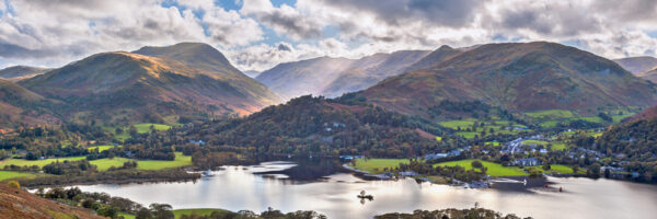 Ullswater and Glenridding Photograph by Jon Allison capturing Glenridding across Ullswater with the Helvellyn range in the distance.
