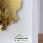 lake district art original 3-D craft design art contour map of derwentwater aerial view cut from one piece of brass and hand polished in a beautiful deep white frame by holly clifford
