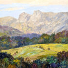 Lake District art original oil painting by local artist Jeff Sudders. A vibrant piece yellow fields and colourful woodland looking towards the Langdale Pikes