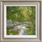 lake district art original oil painting textured oil landscape by terry evans beautiful flowing stream in a thriving woodland. Spring flowers surround the edges of the water. Displayed in a pewter frame.