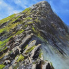 Lake District art original oil painting by Ben Goymour of a peak of a mountain central in the composition and blue skies.