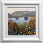 Lake District art original oil painting by Jeff Sudders featuring Windermere islands bright textured flowers and foliage in the foreground sailboats in the water. Displayed in a white frame.