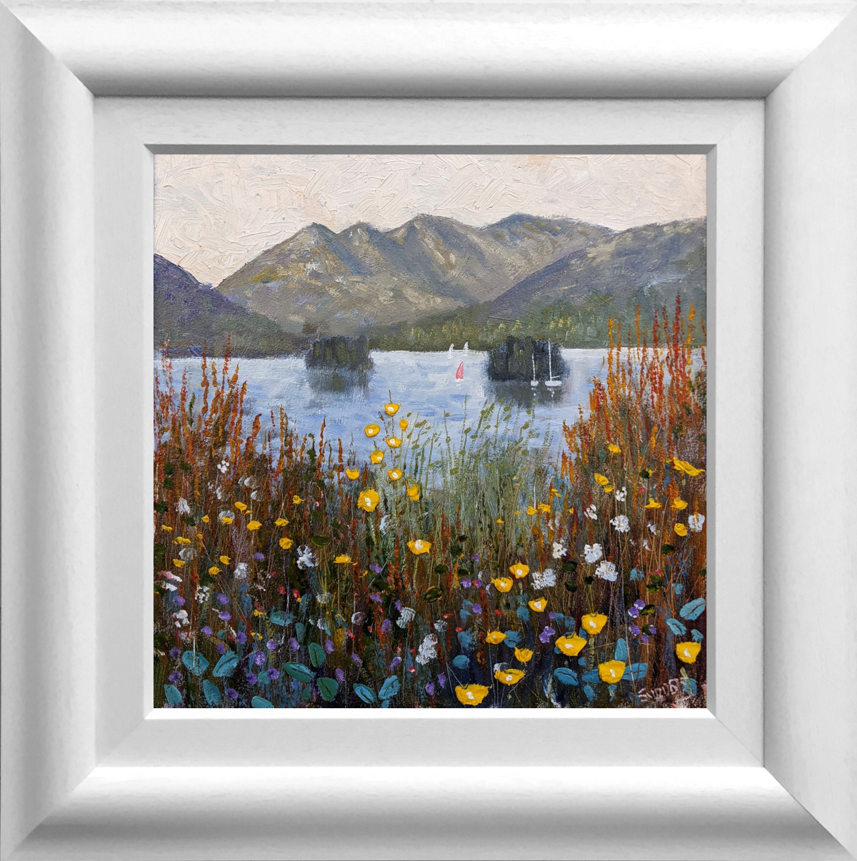 Lake District art original oil painting by Jeff Sudders featuring Windermere islands bright textured flowers and foliage in the foreground sailboats in the water. Displayed in a white frame.