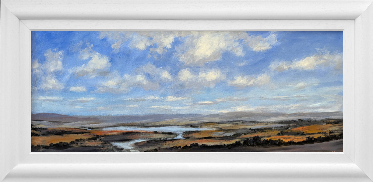Lake District art original oil painting by Jeff Sudders. Afternoon Sky featuring blue cloudy skies orange and earth tone fields below with a lake and fells in the distance. Displayed in a white cushioned frame.