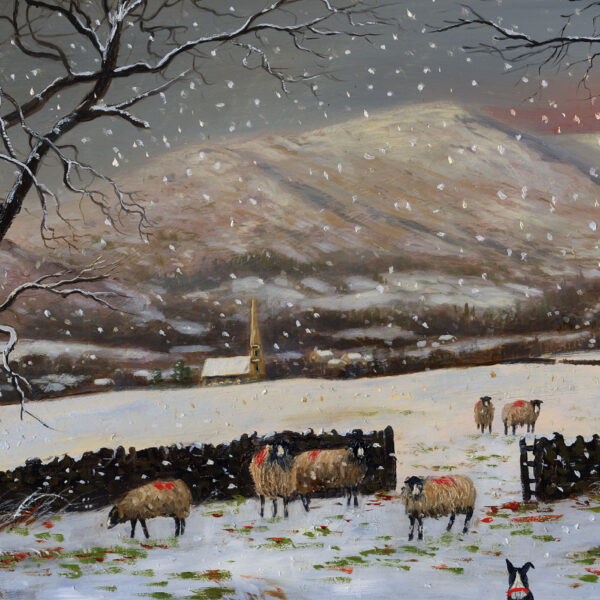 Lake District art print by Jeff Sudders. Sheep stand in the middle of a snow covered field. Ambleside and it's church are in the background with wintry mountains and grey sky.