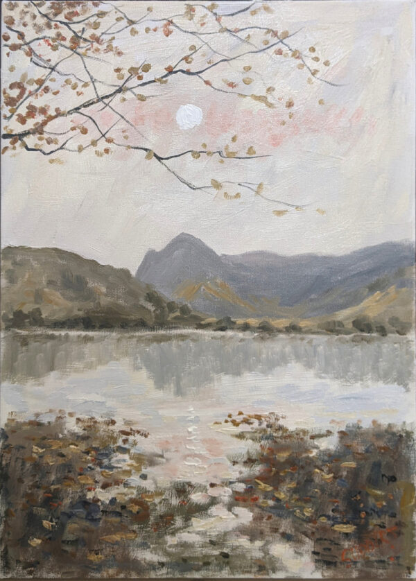 Lake District original oil painting by Jeff Sudders Buttermere II. A lake scene with fells in the distance. Sun high in the sky giving a warm glow. Earthy tones orange leaves in the foreground.