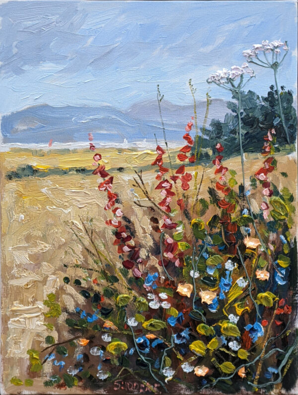 Oil painting of a wildflower-filled field under a pale blue sky. Red and blue flowers bloom in the foreground, with tall white flower clusters rising above them. Golden grasses stretch into the distance toward soft blue hills and a line of dark trees, painted with visible, textured brushstrokes.