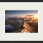 Print by Lake District Photographer Nathan Buckley. Sunrise over striding edge. view from helvellyn of misty fell red tarn ullswater in winter snow