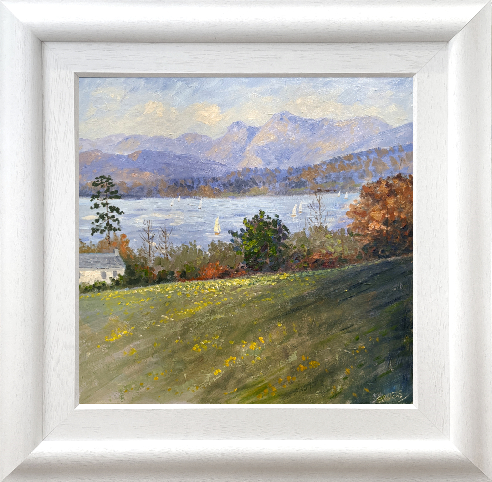 Lake District art original oil painting by local artist Jeff Sudders. Featuring green fields with house lake and looking on to langdale pikes in the distance. Displayed in a white cushioned frame.