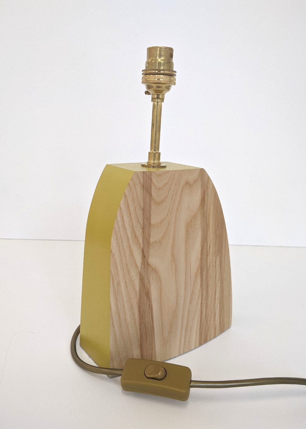 Contra lampbase in yellow by Bob and Eunice from Humblewood handmade in Cumbria.