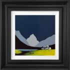 A small white cottage with a dark roof sits on a vivid green field beside calm water. Behind it rise large, simplified mountains in pale grey and black, set against a deep blue sky. The scene uses bold, minimalist shapes and strong colour contrasts to create a dramatic rural landscape.