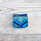 Lotus design fused glass ring dish inspired by the iconic Lotus flower. Made using vibrant coloured glass crafted into simple shapes with hand painted designs.