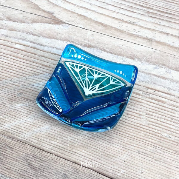 Lotus design fused glass ring dish inspired by the iconic Lotus flower. Made using vibrant coloured glass crafted into simple shapes with hand painted designs.