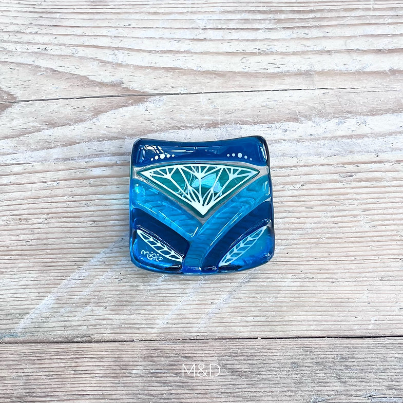 Lotus design fused glass ring dish inspired by the iconic Lotus flower. Made using vibrant coloured glass crafted into simple shapes with hand painted designs.