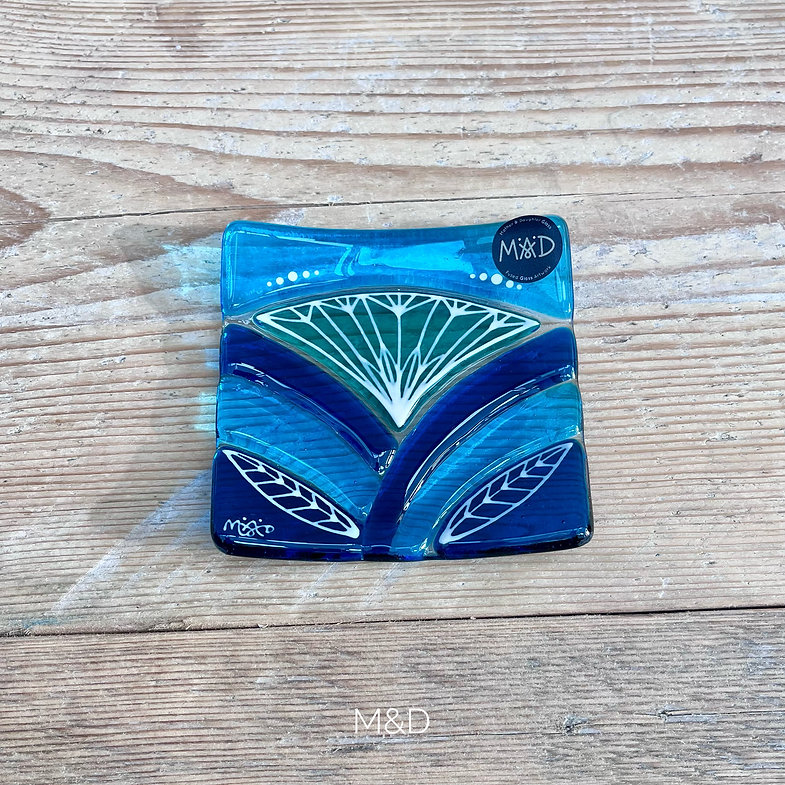 Inspired by the iconic Lotus flower this handmade large dish is made using rich expressive blue and turquoise coloured glass and finished with delicate hand-painted details.