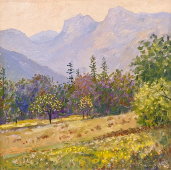 Lake District art original oil painting Summer in the Langdale Valley by Jeff Sudders of colourful trees in front of the Langdale Pikes with a salmon pink sky.