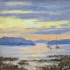 A peaceful coastal painting at sunrise or sunset, with warm yellow and orange light reflecting across calm water. Two anchored sailboats sit near the horizon, backed by layered blue hills. The foreground shows textured strokes of dark seaweed and shoreline vegetation.