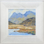 lake district art original oil painting by local artist Jeff Sudders featuring blea tarn blue skies and fells in the distance. Displayed in a white frame with wood grain.