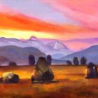 Standing stones on a golden plain beneath a vivid pink and orange sunset, with distant purple mountains.