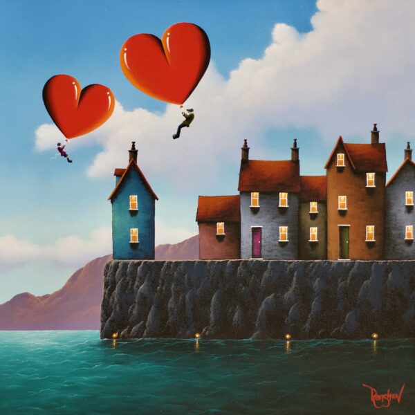 Colourful coastal village with heart-shaped hot air balloons.