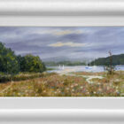 Lake District art original oil painting by Jeff Sudders. Summer Meadows by Windermere featuring sailboats floating on the lake moody grey skies and a meadow of flowers in the foreground. Displayed in a white cushioned frame.