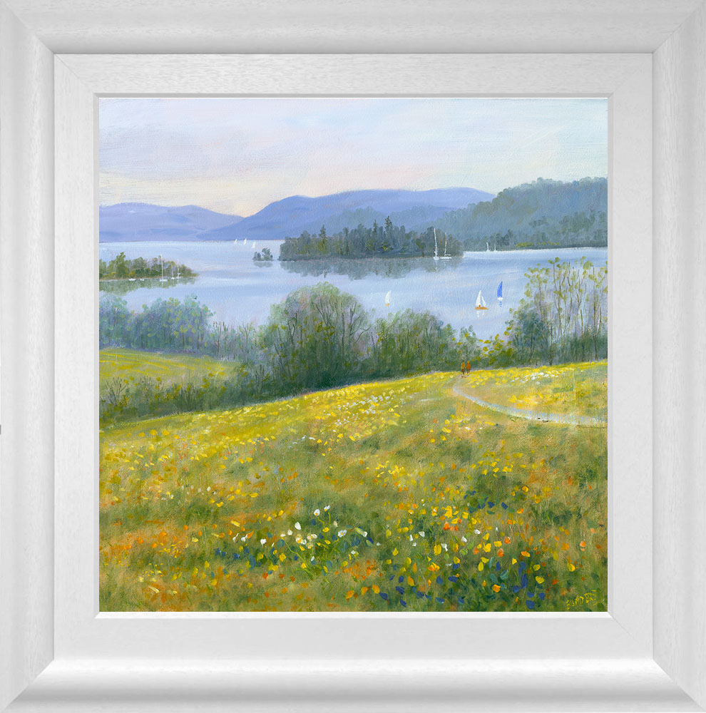 lake district art original oil painting by local artist Jeff Sudders featuring Summertime on Queen Adelaide Hill. Golden fields overlooking lake windermere with sailboats floating by. Displayed in a white cushioned frame.