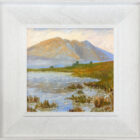 lake district art original oil painting by local artist Jeff Sudders featuring Sunrise on Blencathra fells reflecting on the water in the foreground. Displayed in a white frame.