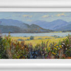 Lake District art original oil painting by Jeff Sudders. A summer scene of Ullswater bright foliage in the foreground yellow fields and vast view off the lake and fells in the distance.