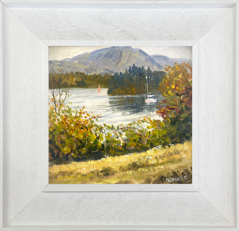 lake district art original oil painting by local artist Jeff Sudders featuring Autumn Colour by Windermere. Autumn leaves sailboats on the water and fells in the distance.