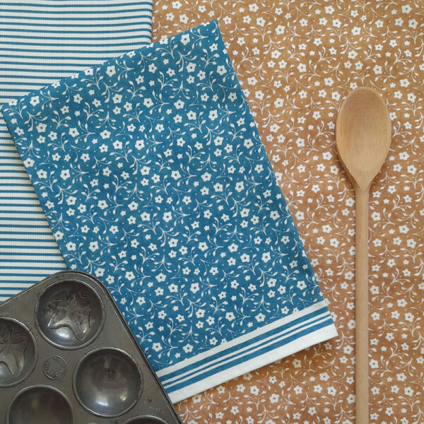 Organic cotton tea towel in Miller Honeyman's Milly design in blue.